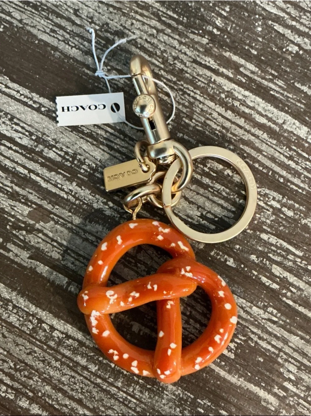 Coach Orange Pretzel Charm Keyring/Bag charm with Gold Hardware. Dusty Included